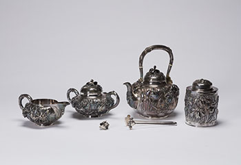 A Four-Piece Japanese Yokohama Sterling Silver ‘Iris’ Tea Set, Meiji Period, Early 20th Century by  Japanese Art