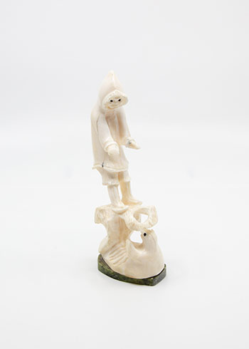 Hooded Figure and Seal by Guyasee Veevee vendu pour $2,813