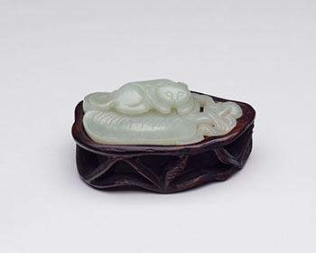 A Chinese Pale Celadon Jade Model of a Cat, Qing Dynasty by Chinese Artist vendu pour $1,125