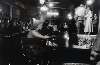 At the Bar, Bourbon St., New Orleans by George S. Zimbel sold for $1,250