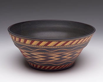 Bowl with Red and Yellow Design by Judith Cranmer sold for $438