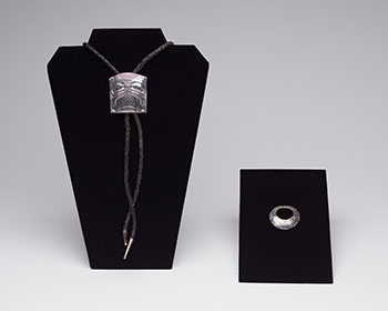 Silver Necklace Pendant (Freda Diesing) and Silver Bolo Tie Pendant (Norman Tait) by Freda Diesing sold for $1,500