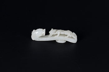 A White Jade Belt Hook, 19th Century par  Chinese Art