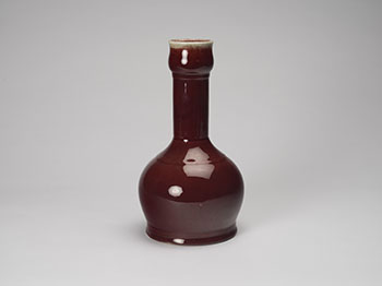 A Chinese Copper Red Glazed Bottle Vase, Late Qing Period par  Chinese Art
