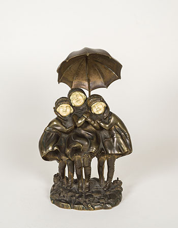 Three Children with Umbrella by Demeter H. Chiparus