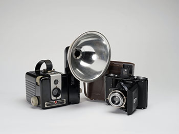 HBC Zeiss Ikon Camera with Leather Case (#0201) and Kodak Brownie Hawkeye Flash Camera (#0465) by Hudson's Bay Company 