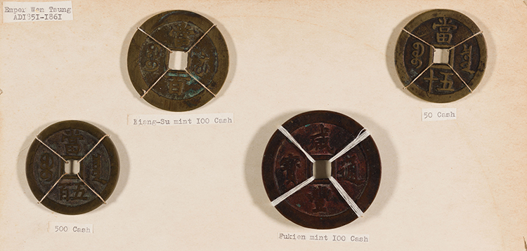 A Group of Twenty-Four Chinese Bronze Coins and Charms, Late Ming Dynasty to Republican Period by  Chinese Art