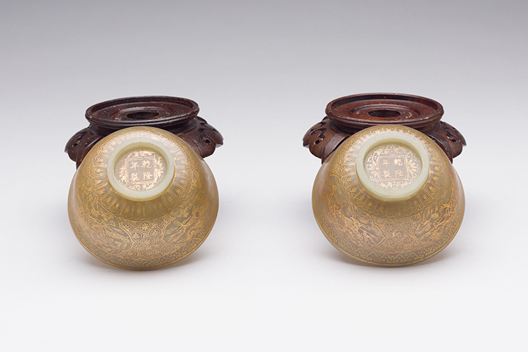 Pair of Chinese Gilt Painted Celadon Jade ‘Mythical Beast’ Bowls, Qianlong Mark and Probably of the Period (1736 - 1795) by  Chinese Art