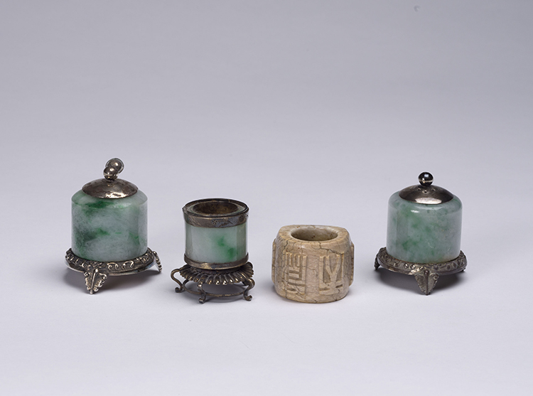 Four Chinese Jade and Jadeite Archer’s Rings, Early 20th Century par  Chinese Art