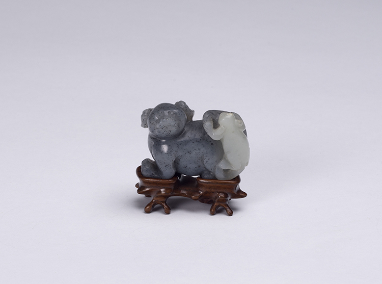 A Chinese Mottled Black and White Jade Dog and Pup Group, 19th Century by  Chinese Art