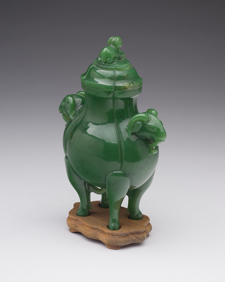 A Chinese Spinach Green Jade 'Rams Head' Vase and Cover, Qing Dynasty by Chinese Artist