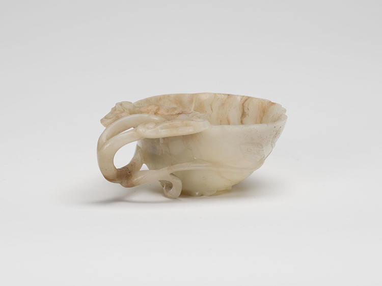 A Chinese Mottled White Jade Lotus Cup, 17th Century par  Chinese Art