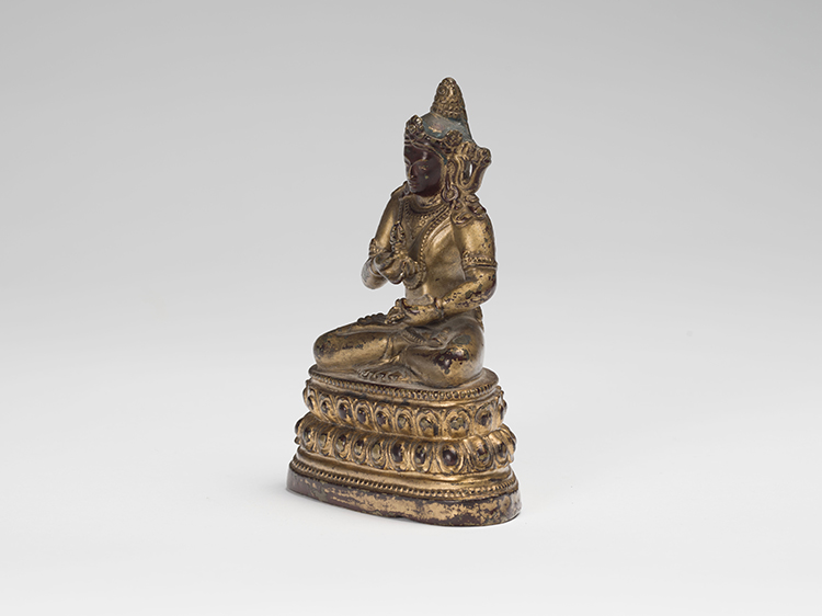 A Sino-Tibetan Gilt Bronze Seated Figure of Vajrasattva, 16th/17th Century by  Chinese Art