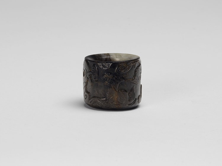 A Chinese Mottled Jade Archer's Ring, 19th Century par  Chinese Art