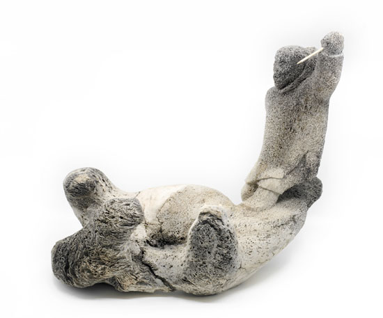 Hunter and Seals by  Inuit Sculpture