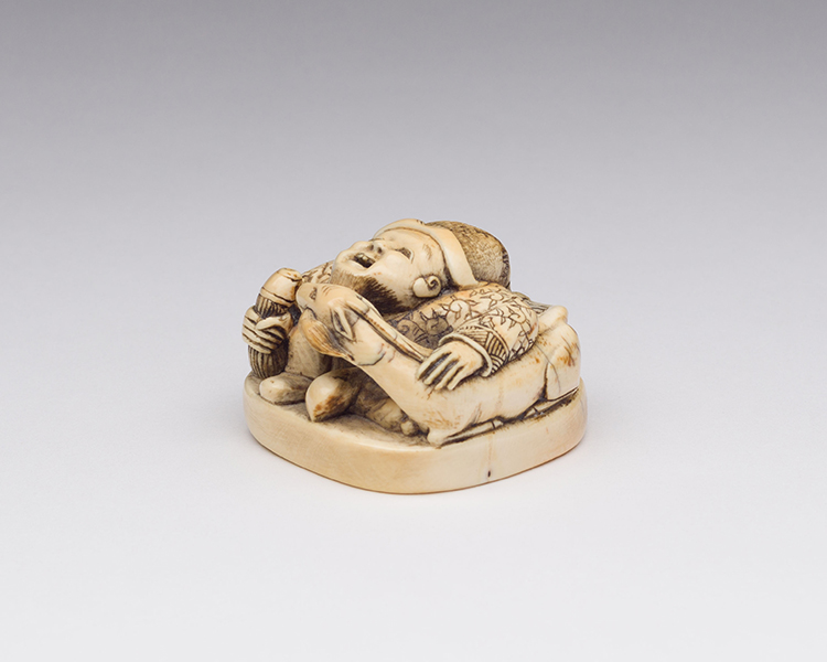 An Unusual Japanese Ivory Seal-Form Chinese Man and Mythical Beast, 19th Century par  Japanese Art