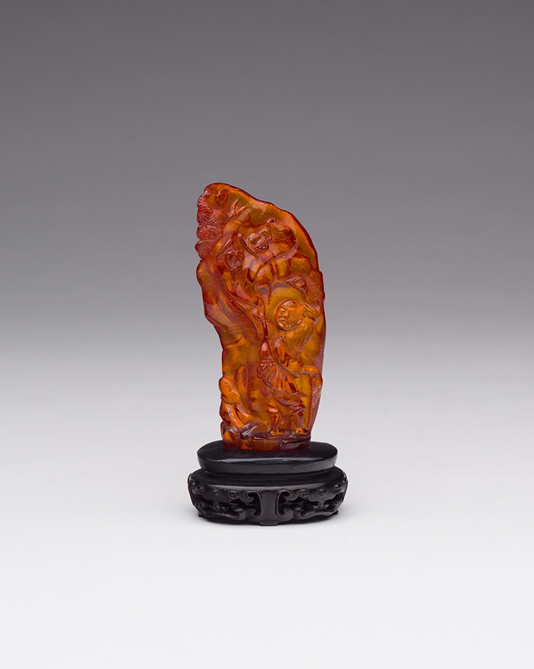 A Chinese Amber Carved Immortal, 19th Century par  Chinese Art