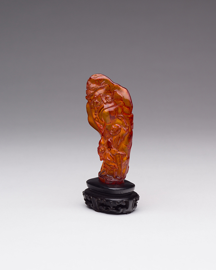 A Chinese Amber Carved Immortal, 19th Century by  Chinese Art