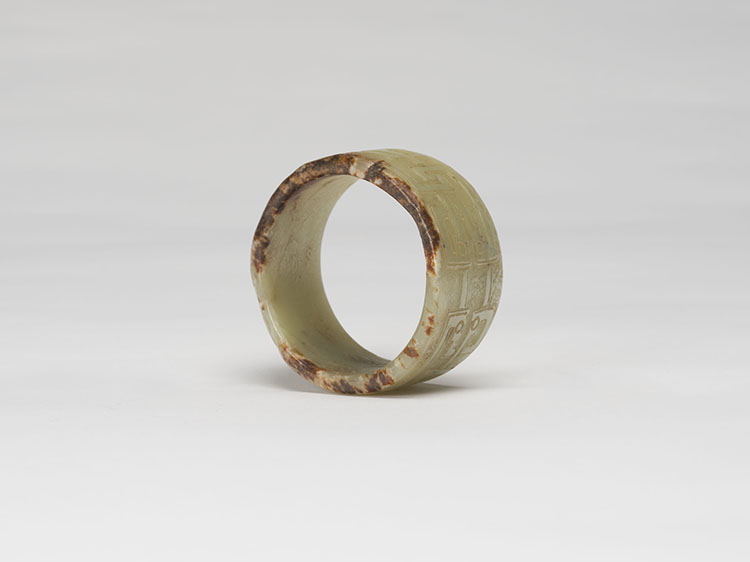 A Chinese Celadon and Russet Tubular Jade Ornament, Possibly Neolithic with Later Carving by  Chinese Art