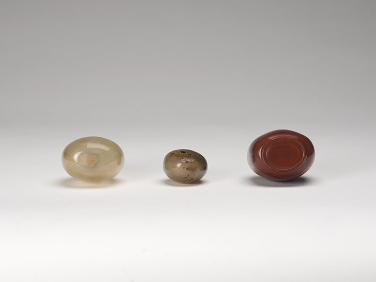 Three Chinese Agate and Realgar Glass Snuff Bottles, 19th Century by  Chinese Art