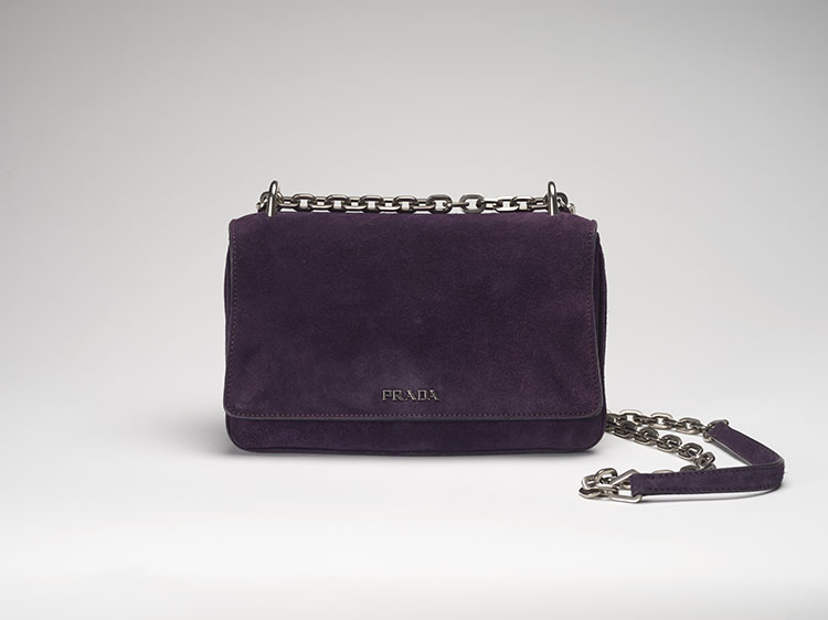 A TWO-WAY PURPLE SUEDE FLAP BAG WITH SILVER HARDWARE by  PRADA