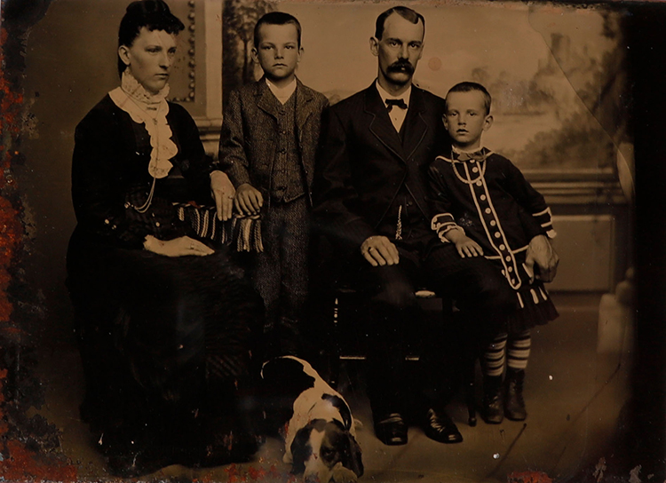 Family with Boy in Dress by  Unknown Artist