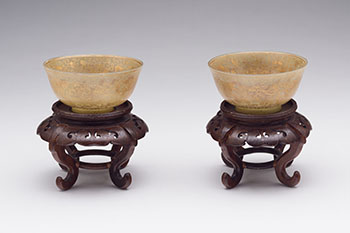 Pair of Chinese Gilt Painted Celadon Jade ‘Mythical Beast’ Bowls, Qianlong Mark and Probably of the Period (1736 - 1795) by  Chinese Art sold for $31,250
